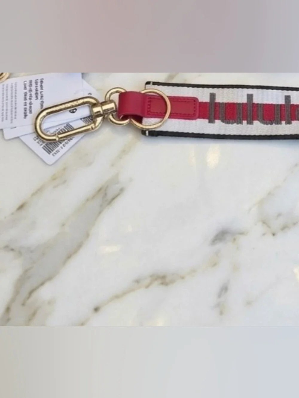 Lululemon Never Lost Keychain Wordmark Coconut Ivory Oxford Red Walnut Crunch
